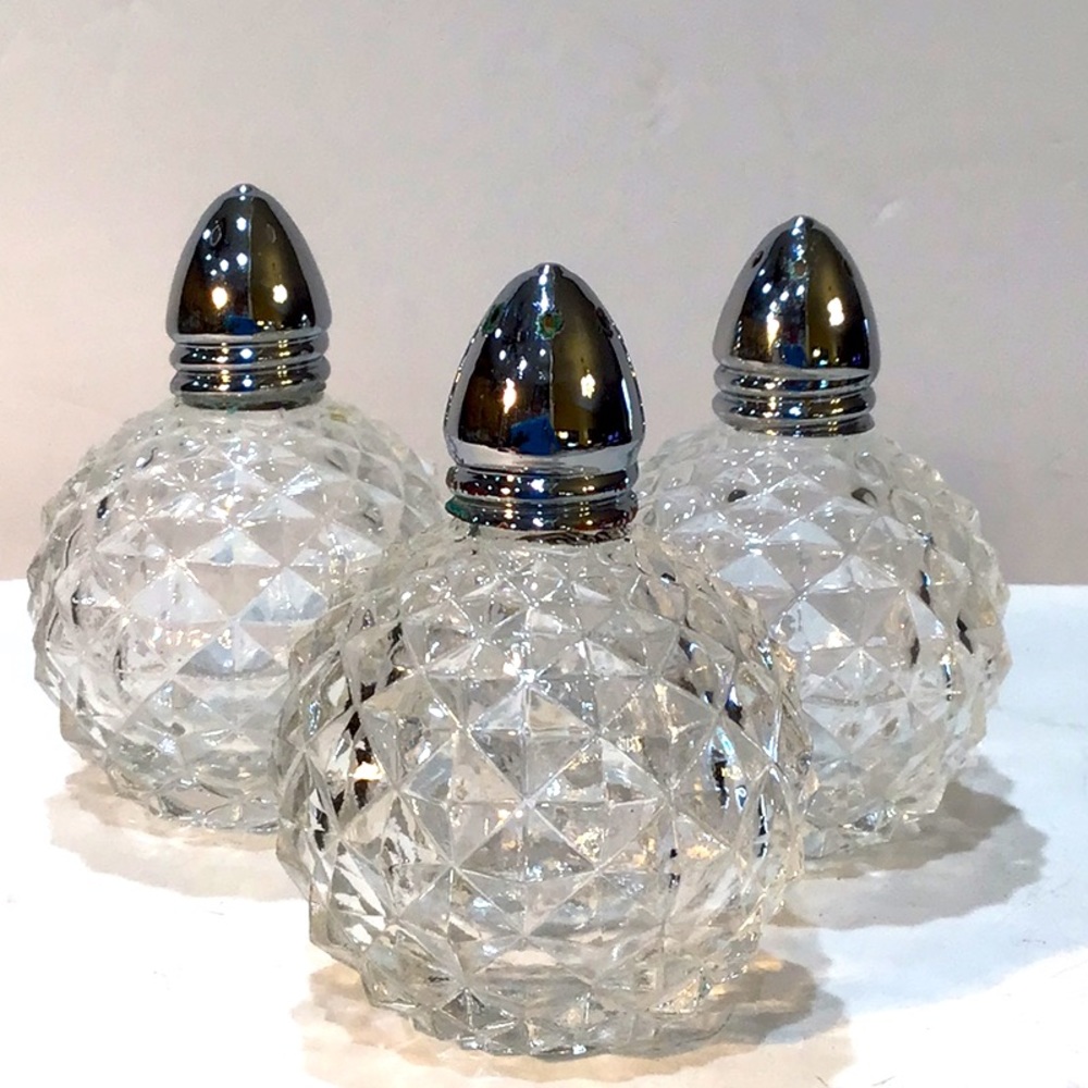 Three diamond cut round salt pepper shakers